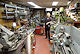 Tony in his workshop.<br>He was disappointed that he had not gotten around to cleaning this shop before I took this photo.